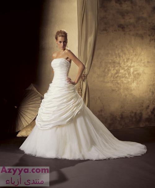 فساتين زفاف فسـتــان زفـــاف Size:30.00 Kb Dim: 500 x 605 Size: Kb Dim: x
